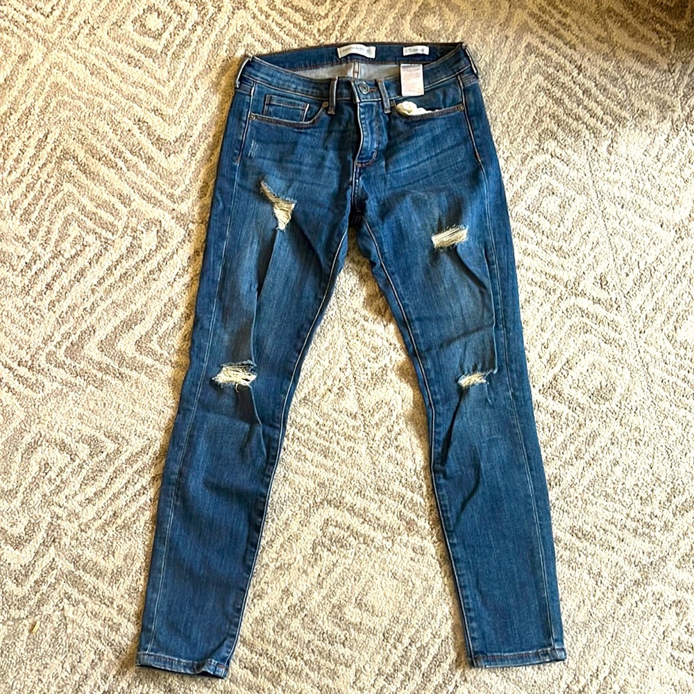 Banana Republic distressed, skinny ankle jeans.  Size 25